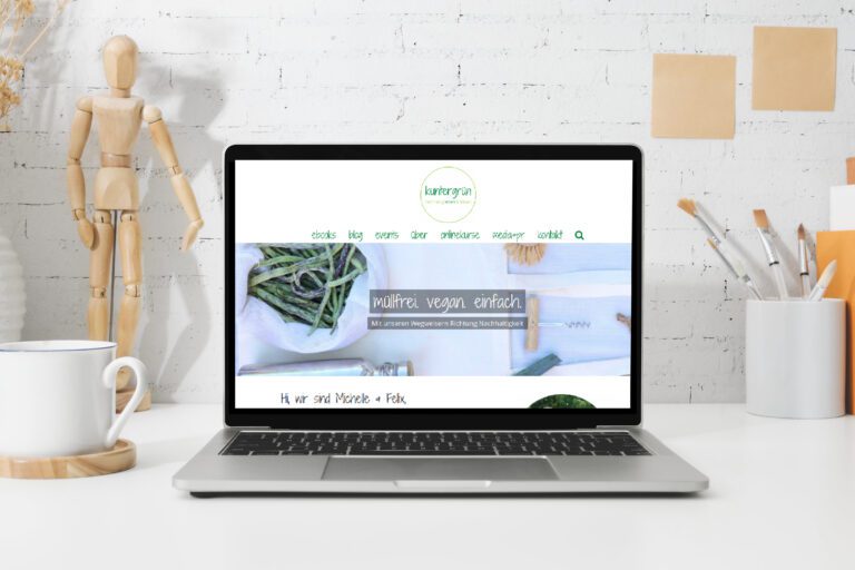 Ein Laptop mit der Startseite von kuntergrün.com